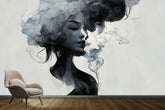 The woman in the smoke on gray background