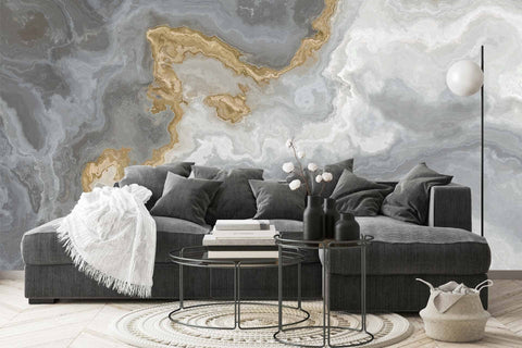 White marble pattern with curly grey and golden veins.