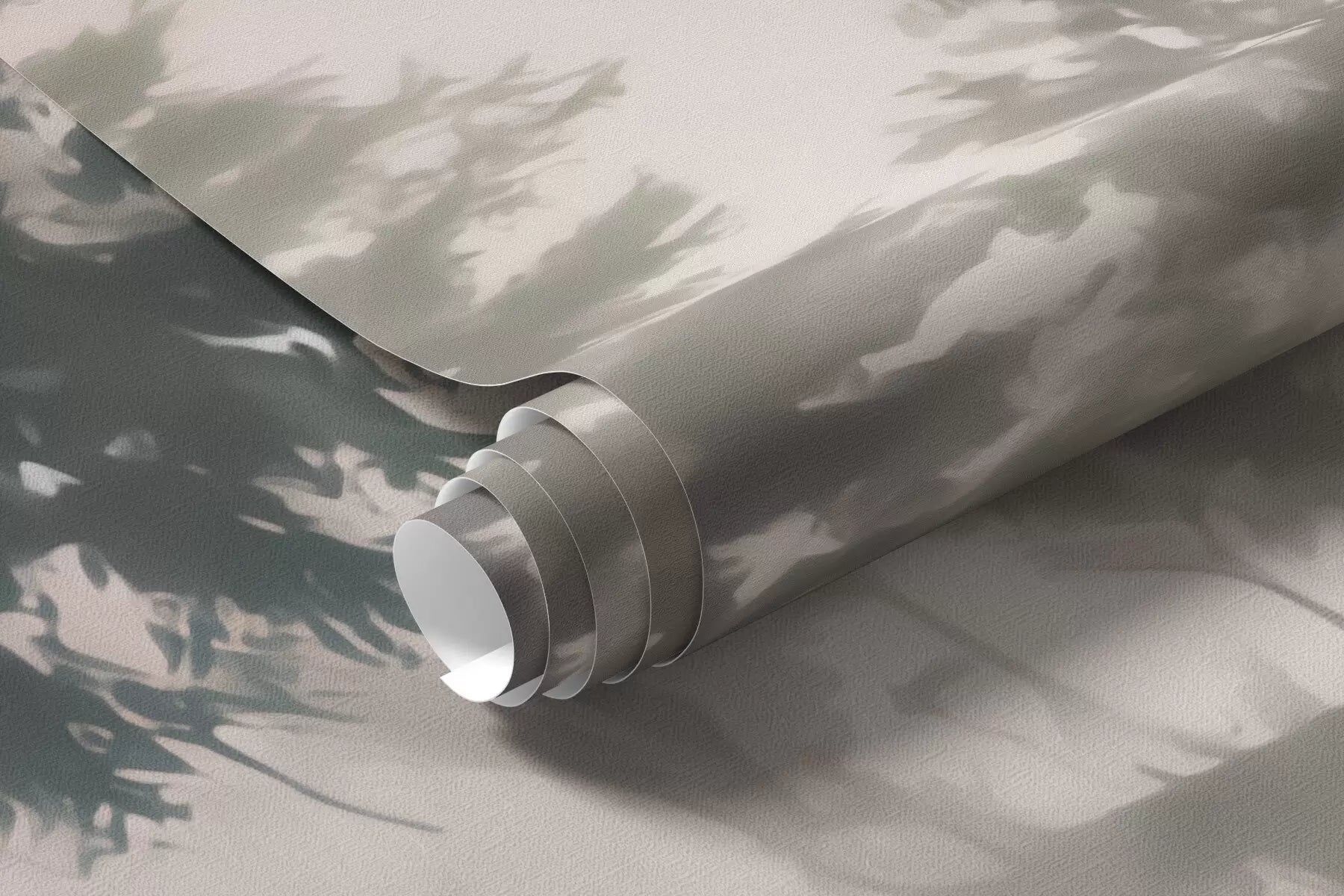 Rolled forest haze mural wallpaper in soft blush and grey-green