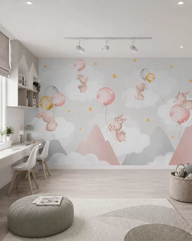 Bunnies with balloons on clouds among mountain peaks