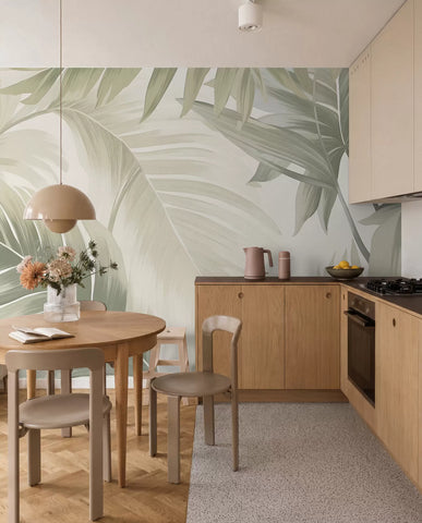 Pattern of large tropical leaves in soft green and beige hues, with smooth gradients and delicate texture details