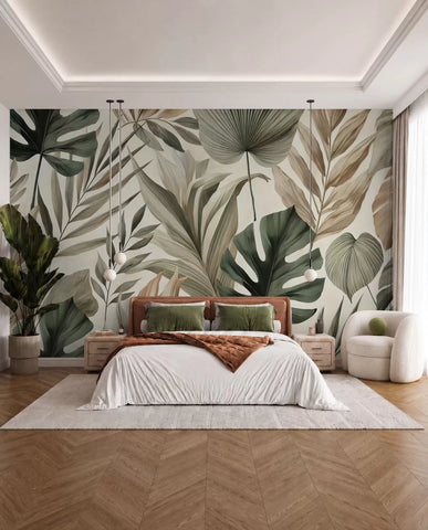 Pastel monstera and palm leaf mural behind a bed with white and rust bedding