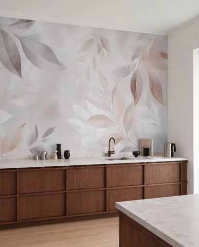 Pastel foliage wall mural with soft blush and grey leaves in a kitchen with walnut cabinets