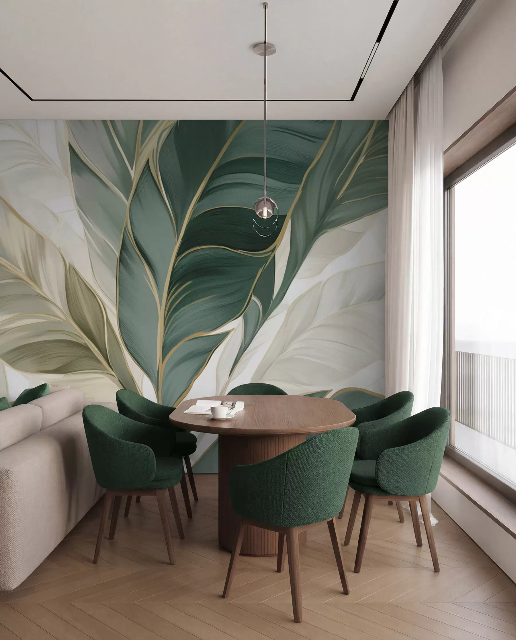 Large green and cream tropical leaves wall mural with gold veins in a dining room with green velvet chairs