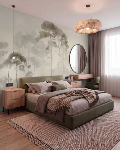 Light watercolor pine tree silhouettes wall mural in soft grey-green behind an olive green bed