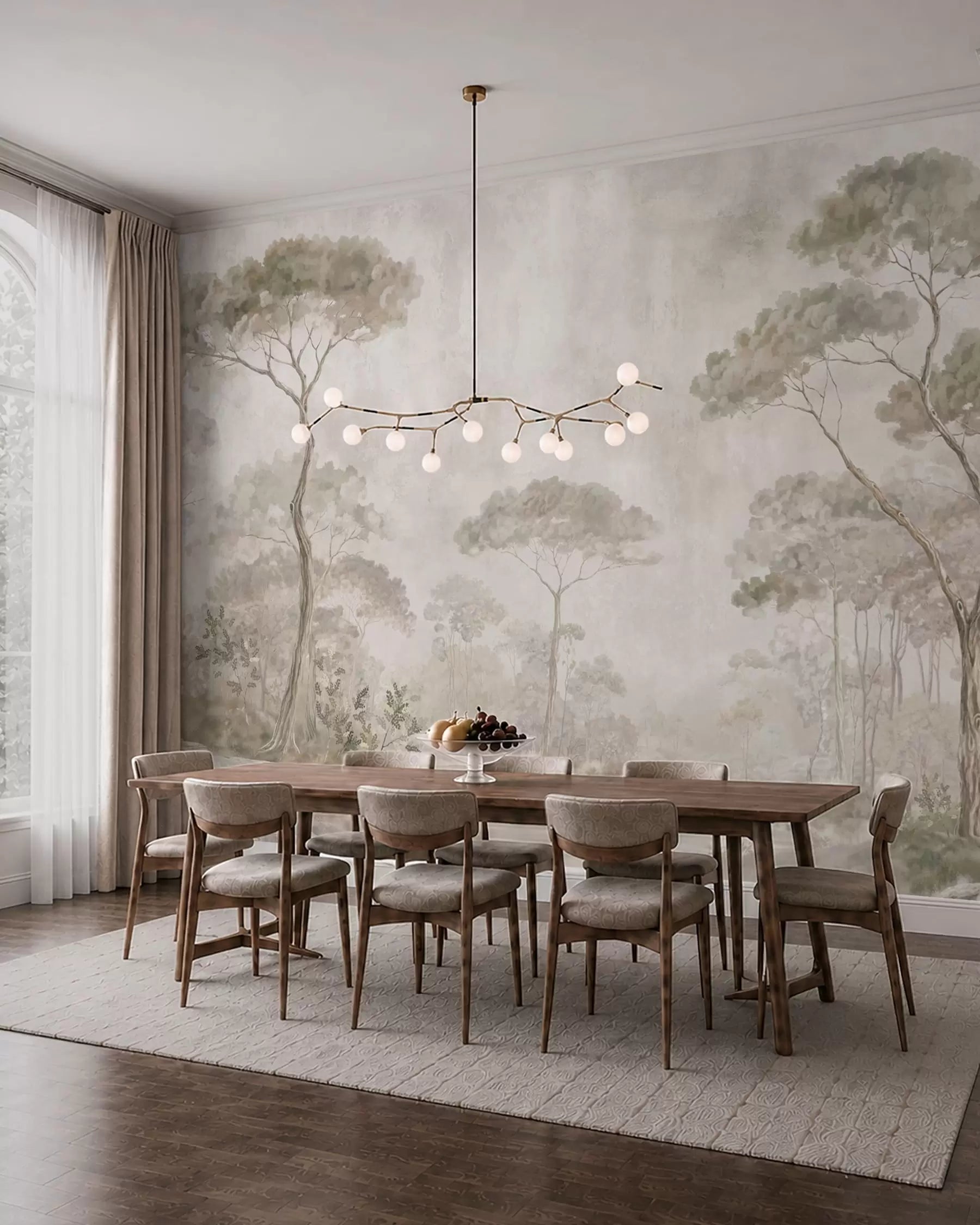Misty forest by calm water wall mural in soft sage and beige in a dining room with a long wooden table