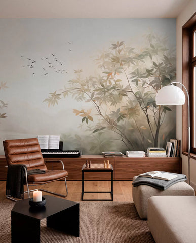 Trees and birds landscape mural in a living room with leather armchairs