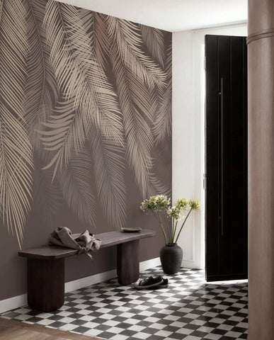Mocha palm leaf mural in a hallway with a black and white checked floor