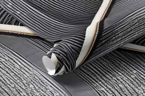 Rolled charcoal tropical leaves mural wallpaper with fine line detail