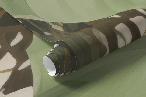 Rolled lush tropical leaves mural wallpaper in sage and green
