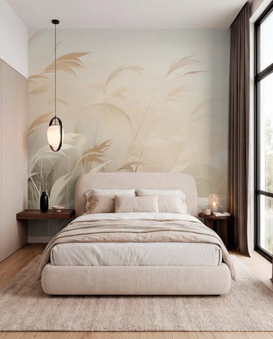 Neutral pampas grass mural behind an upholstered bed in a bright bedroom