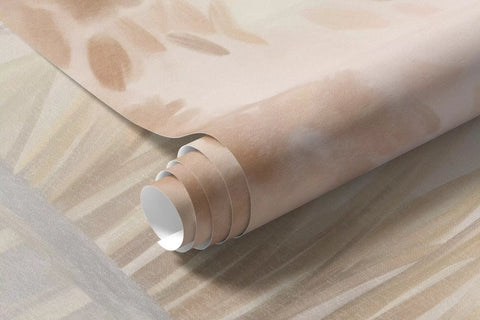 Rolled misty watercolor lake mural wallpaper in blush and peach