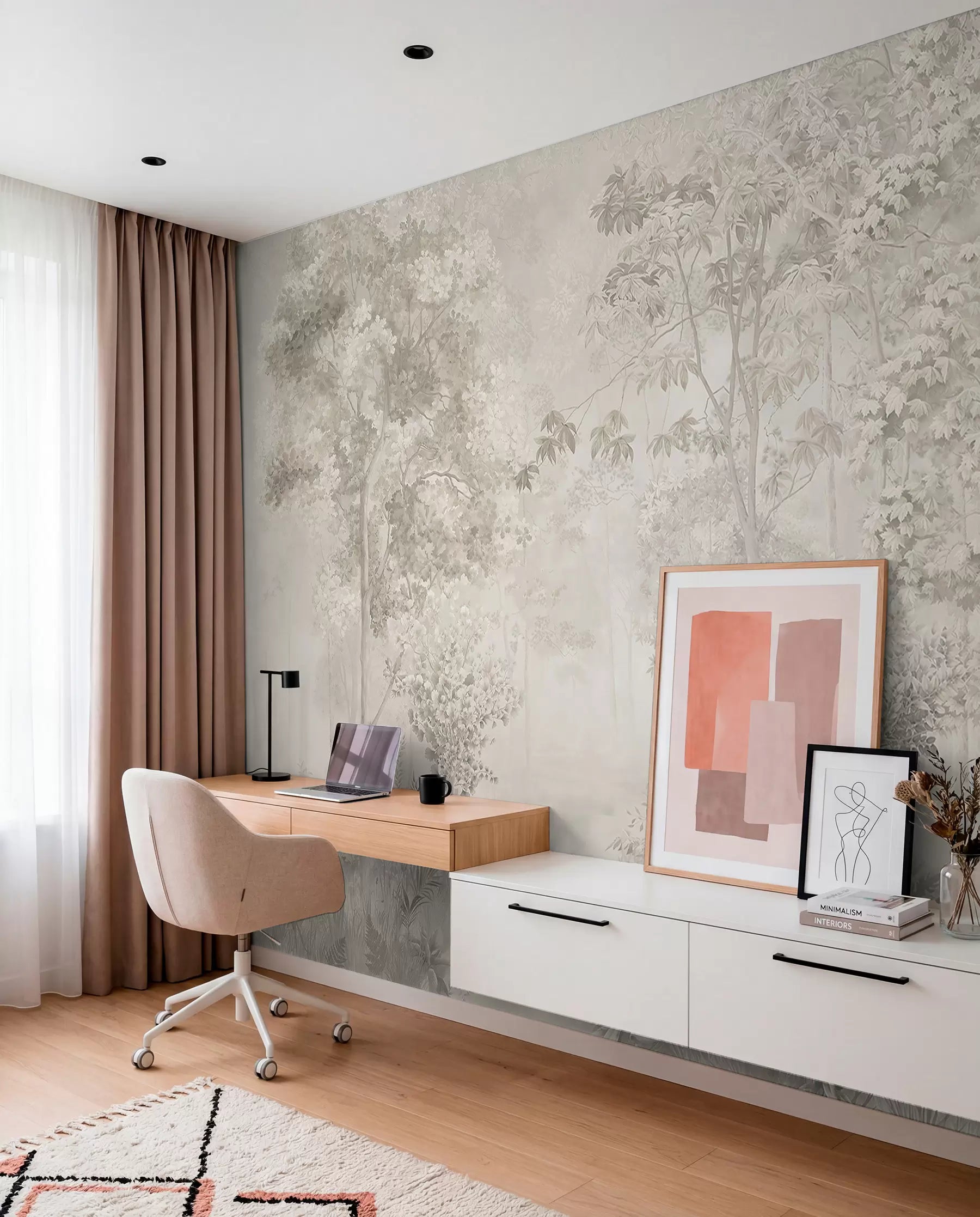 Sketched woodland trees wall mural in soft grey and sage in a home office with a white desk