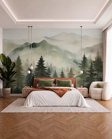 Misty green mountain ridges and pine forest wall mural behind a bed with rust and white bedding