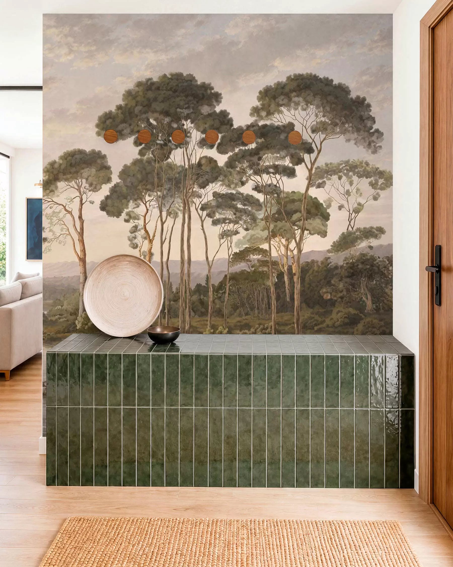 River beyond the grove mural in a hallway with a green tiled console