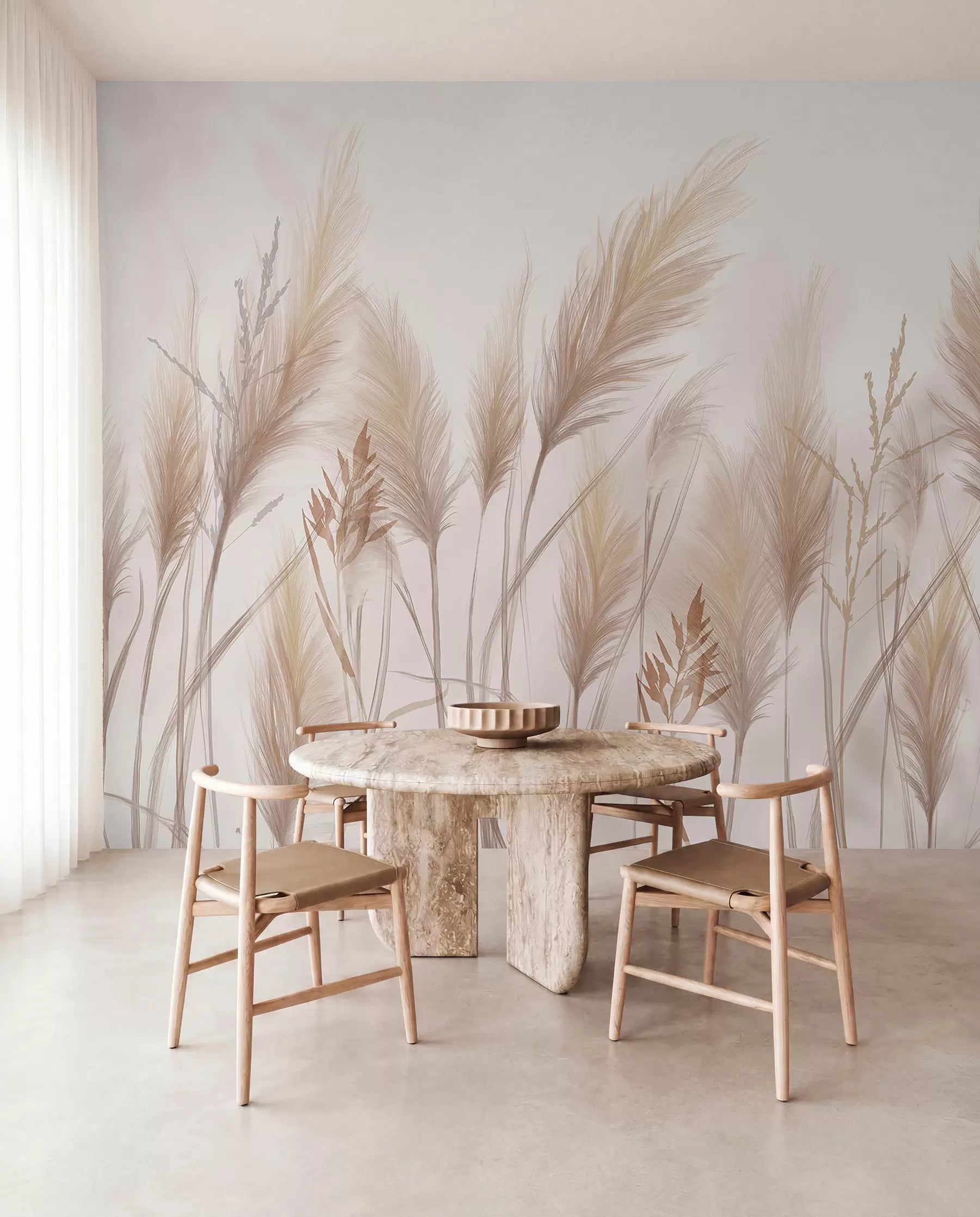 Grasses in the breeze mural in a dining nook with a round table and wooden chairs