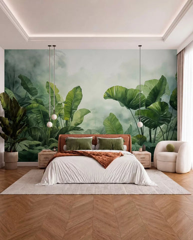 Green tropical leaves fading into mist wall mural in a living room with a cream sofa