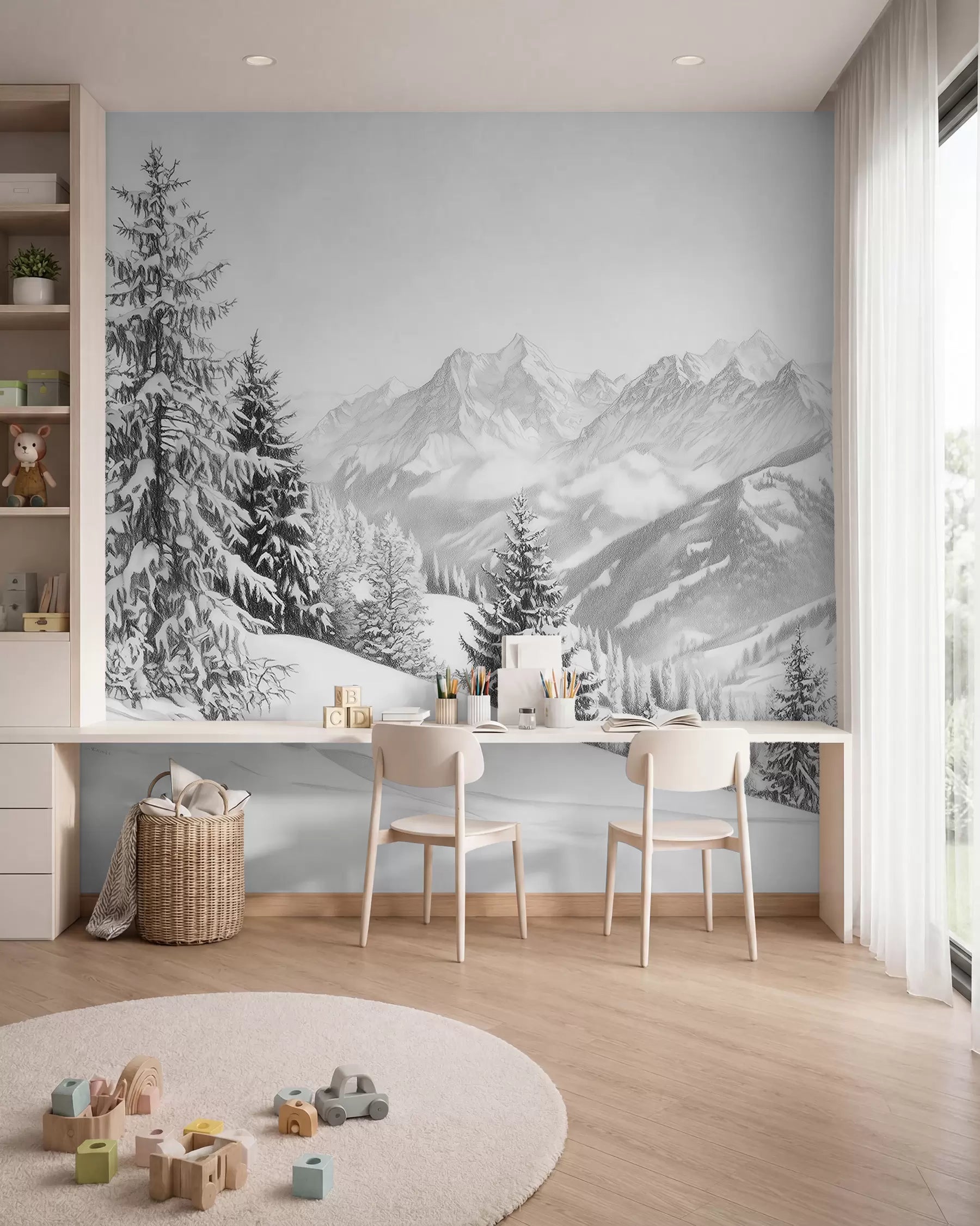 Snowy mountain and pine forest wall mural in soft grey in a study room with a white desk