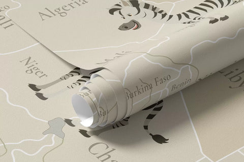 World map for children with animals, airplanes, and hot air balloons. English language. Beige color.